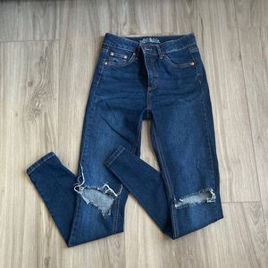 cute jeans with rips in the knew